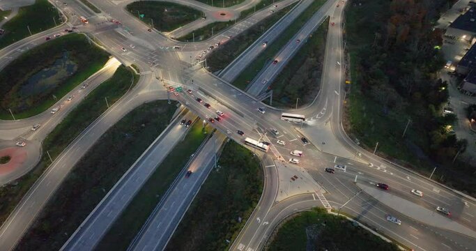 Aerial, drone, evening video of a diverging diamond interchange (DDI), located in Woodbury, NY.