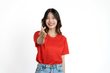 Happy pretty young asian woman red t-shirt isolated white background. hands show love sign
