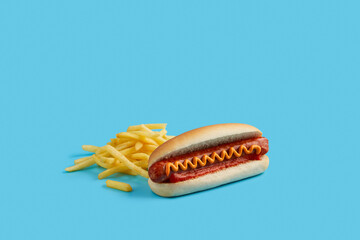 Classic hot dog with french fries on blue table. Restaurant menu.
