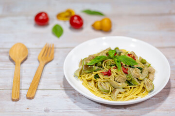 for today's breakfast menu Spaghetti with green curry served on the dining table.