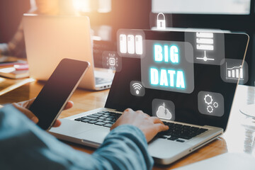 Big data concept, Person using laptop and smartphone with big data icon on vr screen on office desk.