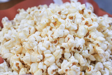 Popcorn texture background. Cinema Movie Fast Food delicious tasty snack. Spend holiday vacation time .