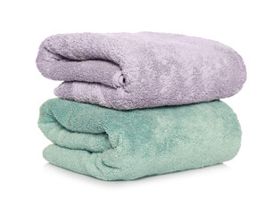 Folded soft terry towels on white background