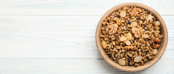 Traditional Christmas slavic dish kutia on white wooden table, top view with space for text. Banner design