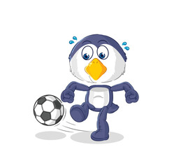 penguin kicking the ball cartoon. cartoon mascot vector