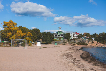 View of Hanko town coast, Hango, Finland, with beach and coastal waterfront, wooden houses and beach changing cabins, Uusimaa, Hanko Peninsula, Raseborg sub-region, summer sunny day