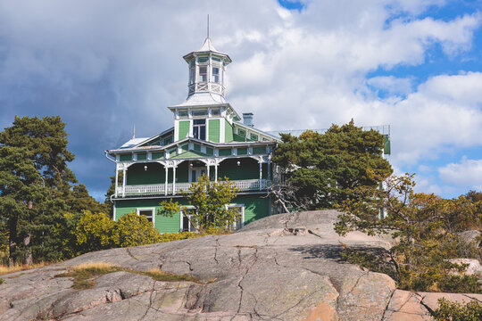 View of Hanko town coast, Hango, Finland, with beach and coastal waterfront, wooden houses and beach changing cabins, Uusimaa, Hanko Peninsula, Raseborg sub-region, summer sunny day