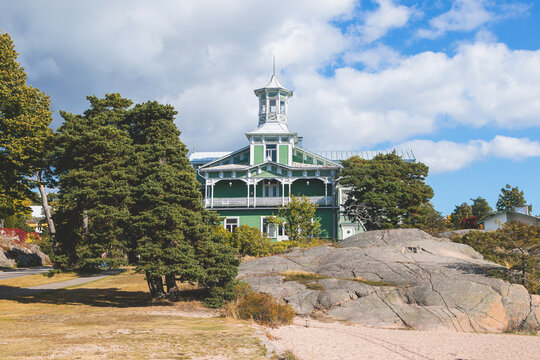 View of Hanko town coast, Hango, Finland, with beach and coastal waterfront, wooden houses and beach changing cabins, Uusimaa, Hanko Peninsula, Raseborg sub-region, summer sunny day