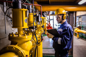 Heating plant operator maintaining low pressure steam inside power plant.