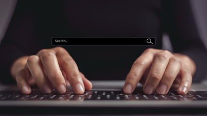 Female hand typing on laptop keyboard to search website. Concept of precisely finding exactly what...