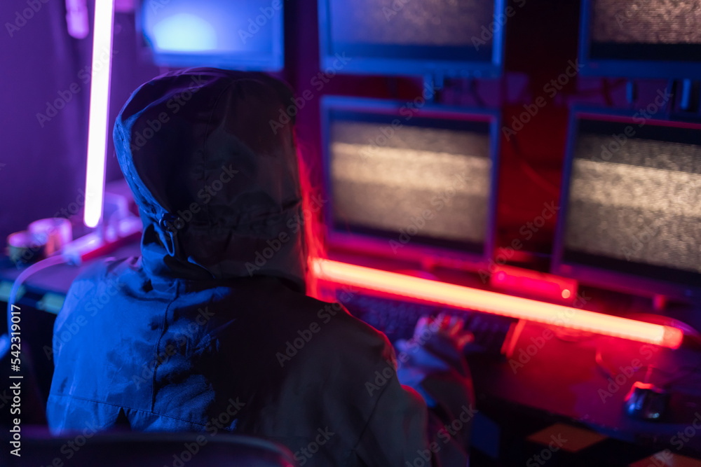 Fototapete Hack program concept. Professional woman hacker using keyboard send coding bad data and error into software computer online system and spreading to global stolen personal information.