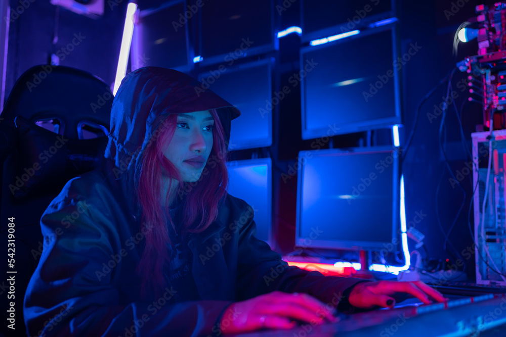 Fototapete Hack program concept. Professional woman hacker using keyboard send coding bad data and error into software computer online system and spreading to global stolen personal information.