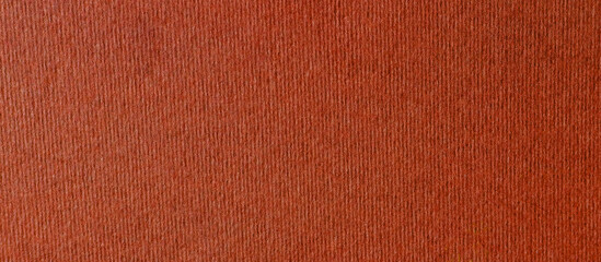 Dark red brown knitted fabric texture.  wool or tweed fabric for grunge background. Detailed warm...