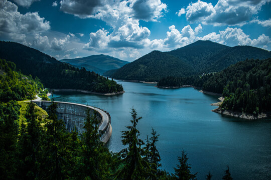 Romania, Barajul Drăgan şi Lacul Floroiu is an artificial dam in Cluj region. It is 120 meters high, 424 meters long and it is one of the biggest dams in Romania with reservoir area of 300 hectars.