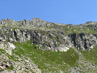 Rocky mountain peaks Poncione di Fieud (2696 m) and Fibbia (2738 m) in the massif of the Swiss Alps...