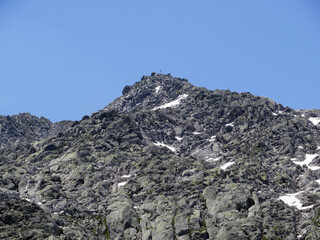 Rocky mountain peaks Poncione di Fieud (2696 m) and Fibbia (2738 m) in the massif of the Swiss Alps...