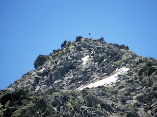 Rocky mountain peaks Poncione di Fieud (2696 m) and Fibbia (2738 m) in the massif of the Swiss Alps...