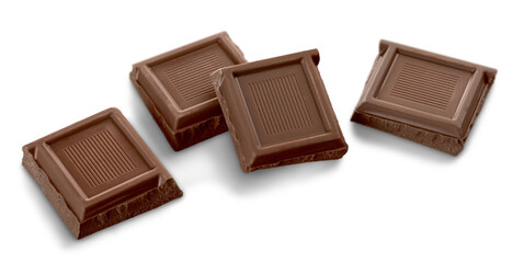 Pieces of delicious chocolate on  background
