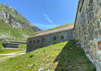 Fototapeta na wymiar Fort Hospiz St. Gotthard Pass (Armeebezeichnung «Hospizwerk San Gottardo» B 9477 or Forte Ospizio San Gottardo) in the Swiss Alps, Airolo - Canton of Ticino (Tessin), Switzerland (Schweiz)
