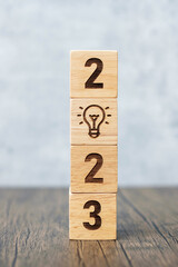2023 block with lightbulb icon. Business Idea, Creative, Thinking, brainstorm, Goal, Resolution,...