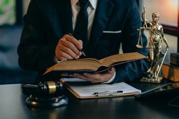 Lawyer's Office of Law Counsel works with the judge's column and the Goddess of Justice's scales on...