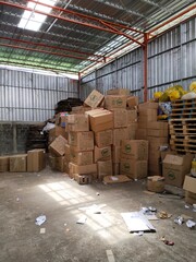 recyclable waste, consisting of piles of cardboard and plastic or aluminum plastic