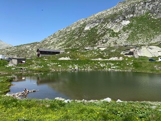 Summer atmosphere on the Lago dei Monti or Lake of the Mountains in the Swiss alpine area of the...
