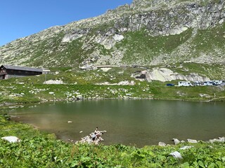 Summer atmosphere on the Lago dei Monti or Lake of the Mountains in the Swiss alpine area of the...