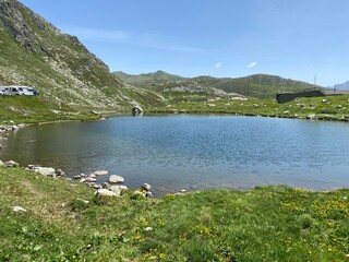 Summer atmosphere on the Lago dei Monti or Lake of the Mountains in the Swiss alpine area of the...