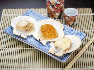 Grilled Hotate Scallops serve on japanese porcelain plate