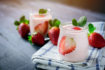Healthy food of yogurt, Strawberry Yogurt,yogurt with fresh strawberry, wood background
