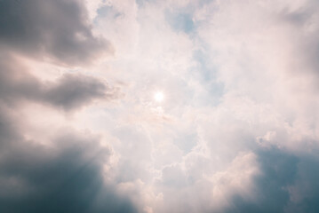 clouds in the blue sky with sun