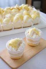 Durian cake with fresh durian. Homemade bakery concept.