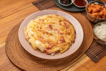 Korean pancake or Pajeon, Korean  dish made from egg and wheat flour with Potato bacon.Traditional korean food.