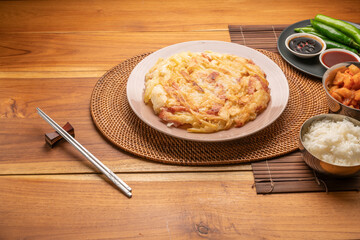 Korean pancake or Pajeon, Korean  dish made from egg and wheat flour with Potato bacon.Traditional korean food.