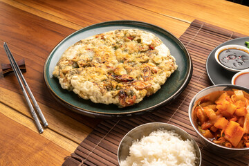 Korean pancake or Pajeon, Korean  dish made from egg and wheat flour with chili and chives vegetable.