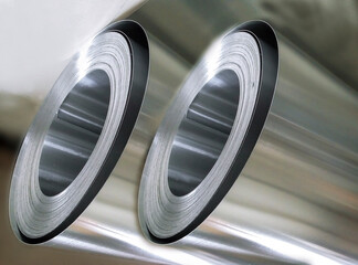 two rolls of aluminum metal material in industrial room