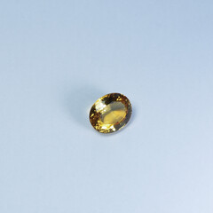 genuine mined natural yellow sapphire oval cut shape precious gemstones for design gems jewellery. Selective focus natural yellow sapphire Oval cutting gemstone for design gold jewelry.