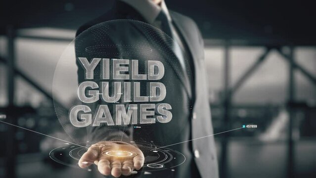 Yield Guild Games with hologram businessman concept