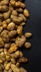 Peanut in a shell texture with space for texts. Food background wallpaper