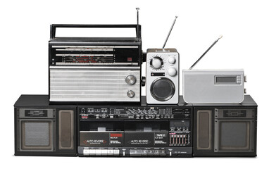 Old fashioned radios isolated on white background