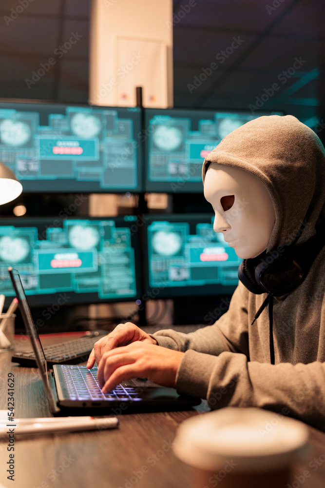 Poster scary male scammer wearing mask hacking database servers, hacker with hood breaking into computer sy