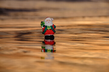 Summer Santa Claus. Christmas and New Year on sea vacation.