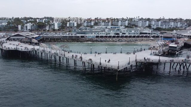 Pan Back Shot of Redondo Beach Pier, Paddleboarders Chilling in the Water.
Redondo Pier, Los Angeles, California by Drone 4k
Aerial Nature + Travel