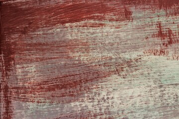 Obraz premium Abstract brown-gray textured background. A wall painted with a rough brush.