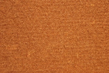 Fototapeta na wymiar Dark brown recycled cardboard texture as background 