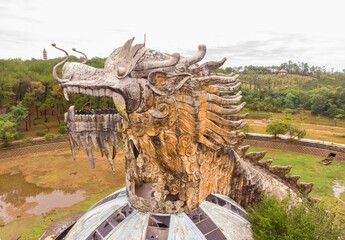 Statue of a dragon in e Thuy Tien Lake abandoned water park