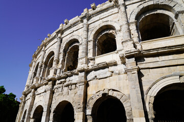 Exterior detail of Arena of Nimes ancient Roman amphitheater in france