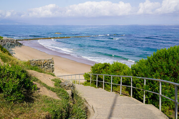 Fototapeta na wymiar coastal staircase path access to sea beach southwest in Biarritz coast Atlantic south ocean in basque country france