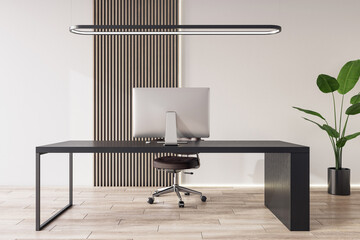 Front view on modern computer on stylish dark work table in spacious cabinet with light wall background and wooden floor. 3D rendering